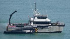 Teen charged over record crossing on 'mega dinghy'