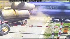 Watch: Moment passenger train crashes into trailer carrying straw bales